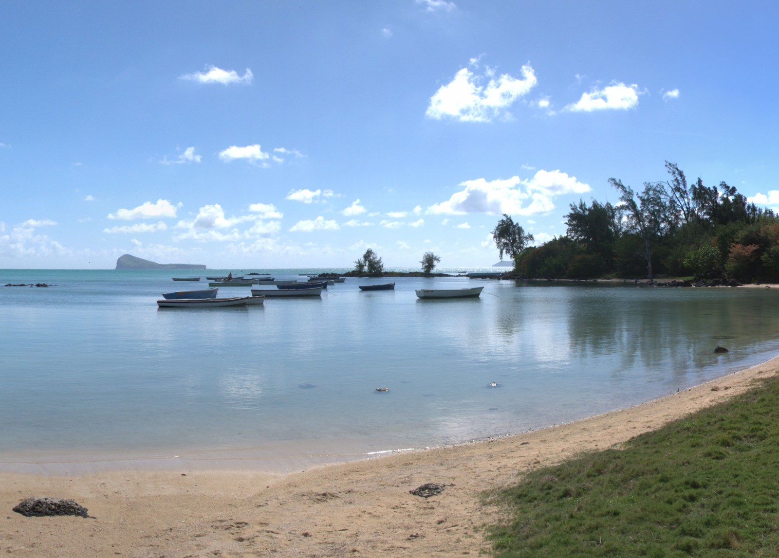 Boats moored in the Grand Gaube lagoon