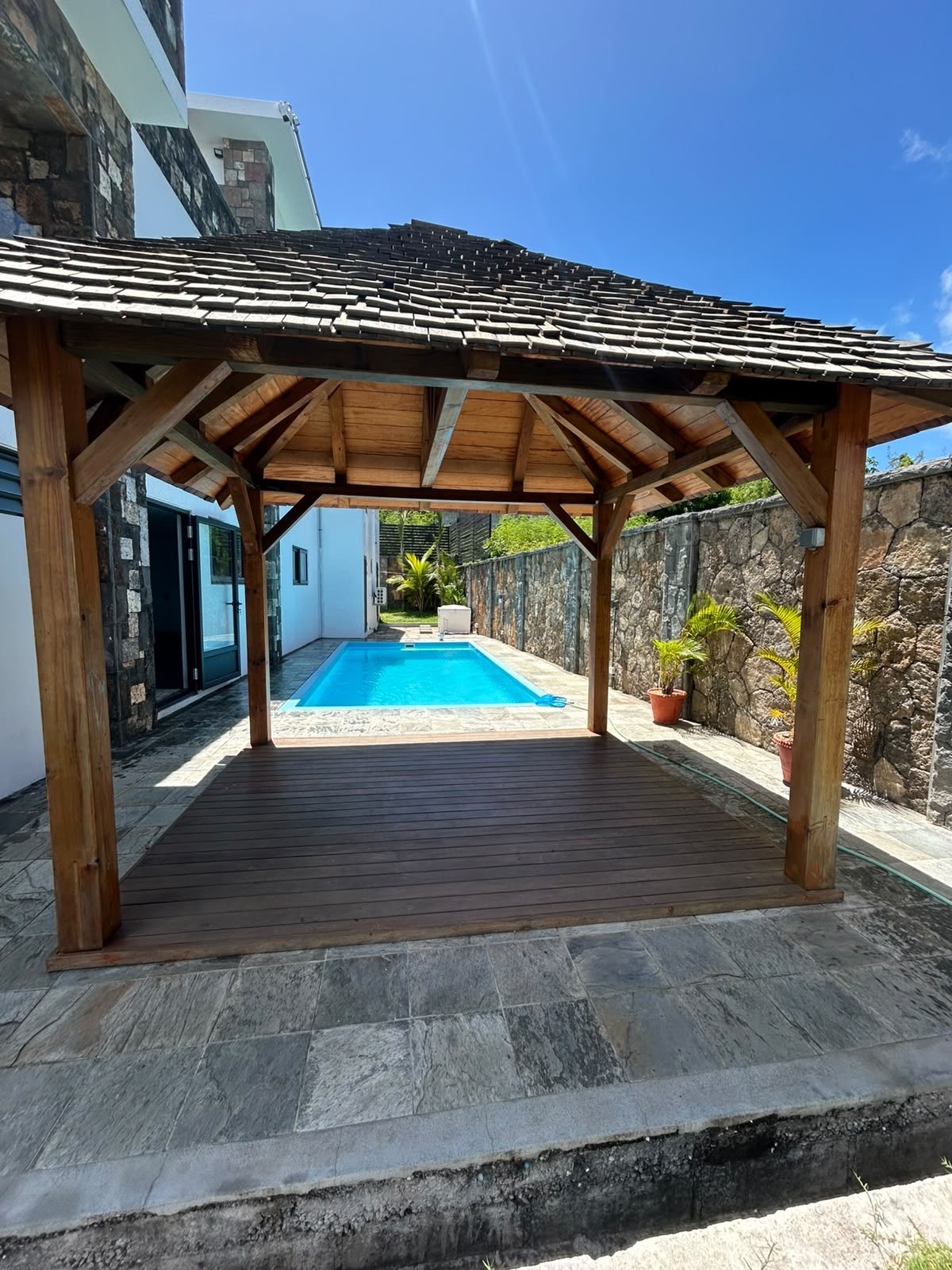 Covered terrace and pool at La Isla Villa